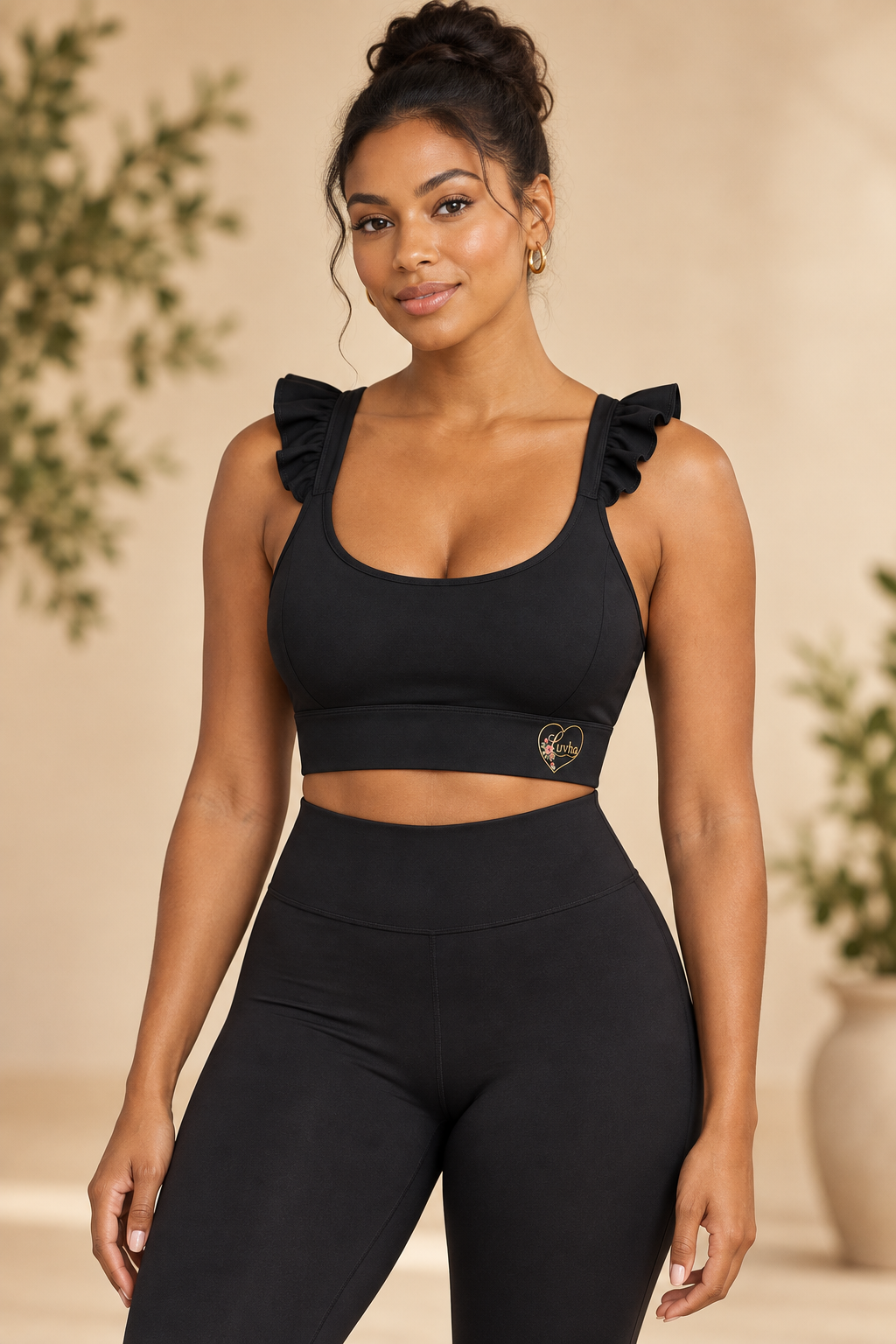 Luvha Ruffle Yoga Tank in Black on model