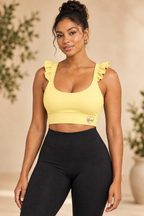 Luvha Ruffle Yoga Tank in Yellow on model